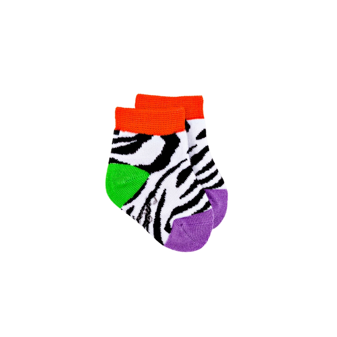 Zebra-patterned sock with orange top and purple sole on a white background
