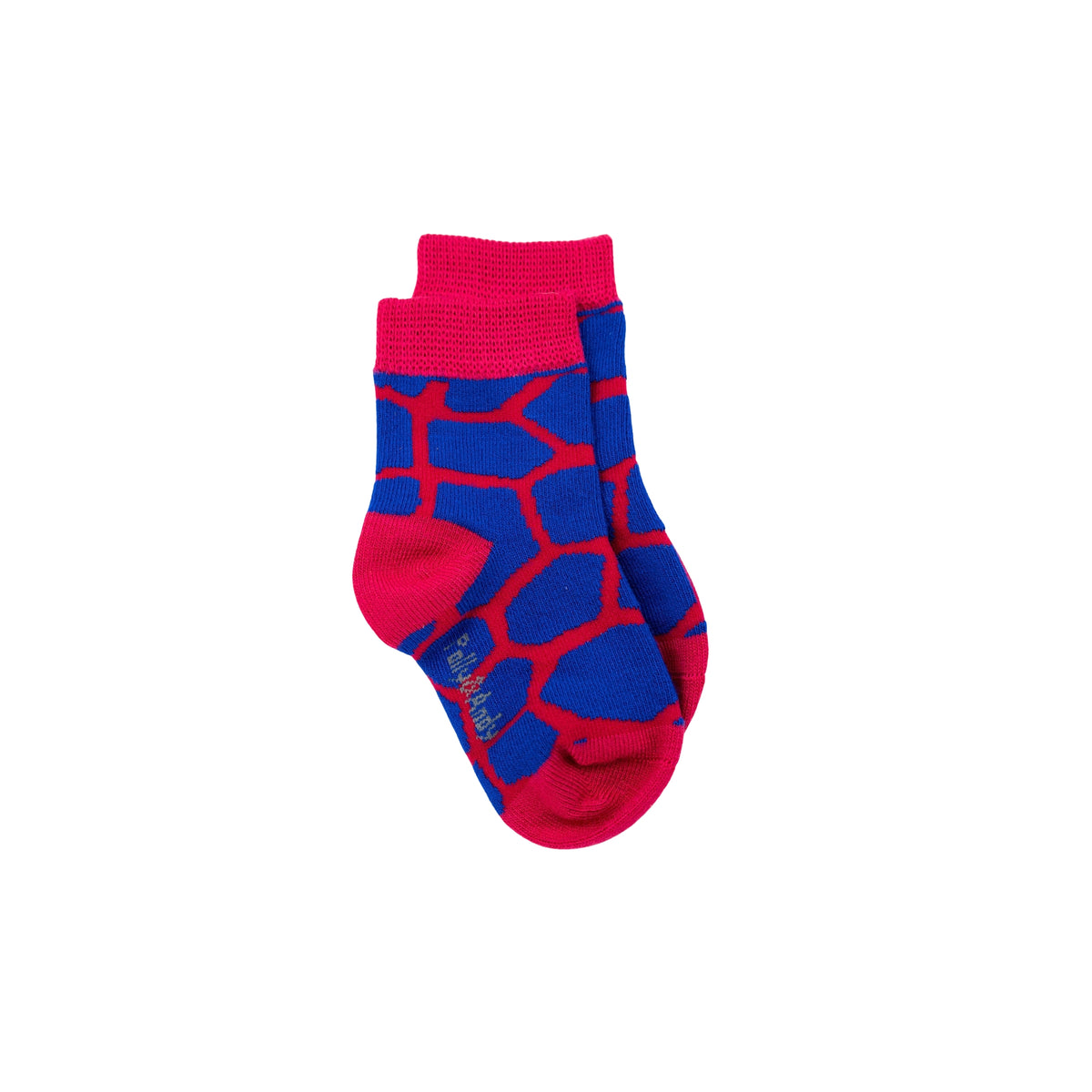 A pair of toddlers seamless bamboo crew socks featuring a bold blue and red giraffe-like abstract pattern, with solid red cuffs, toes, and heels, displayed against a plain white background.