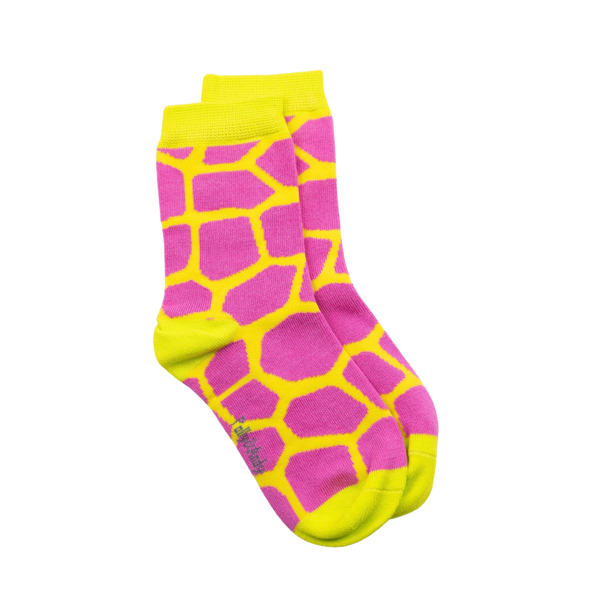 A pair of seamless soft top bamboo kids crew socks with a bright pink and neon yellow giraffe-print pattern, featuring a neon yellow cuff, heel, toe, and sole, shown against a plain white background.