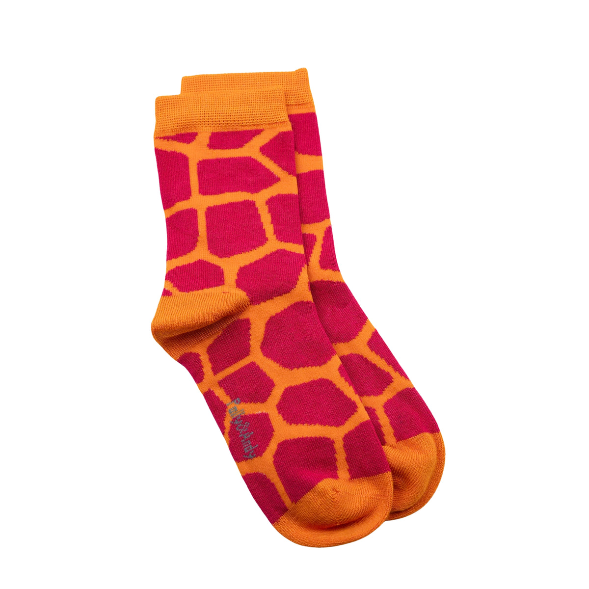A pair of kids crew bamboo seamless socks featuring a giraffe-inspired pattern with bright orange and red sections, shown against a plain white background.