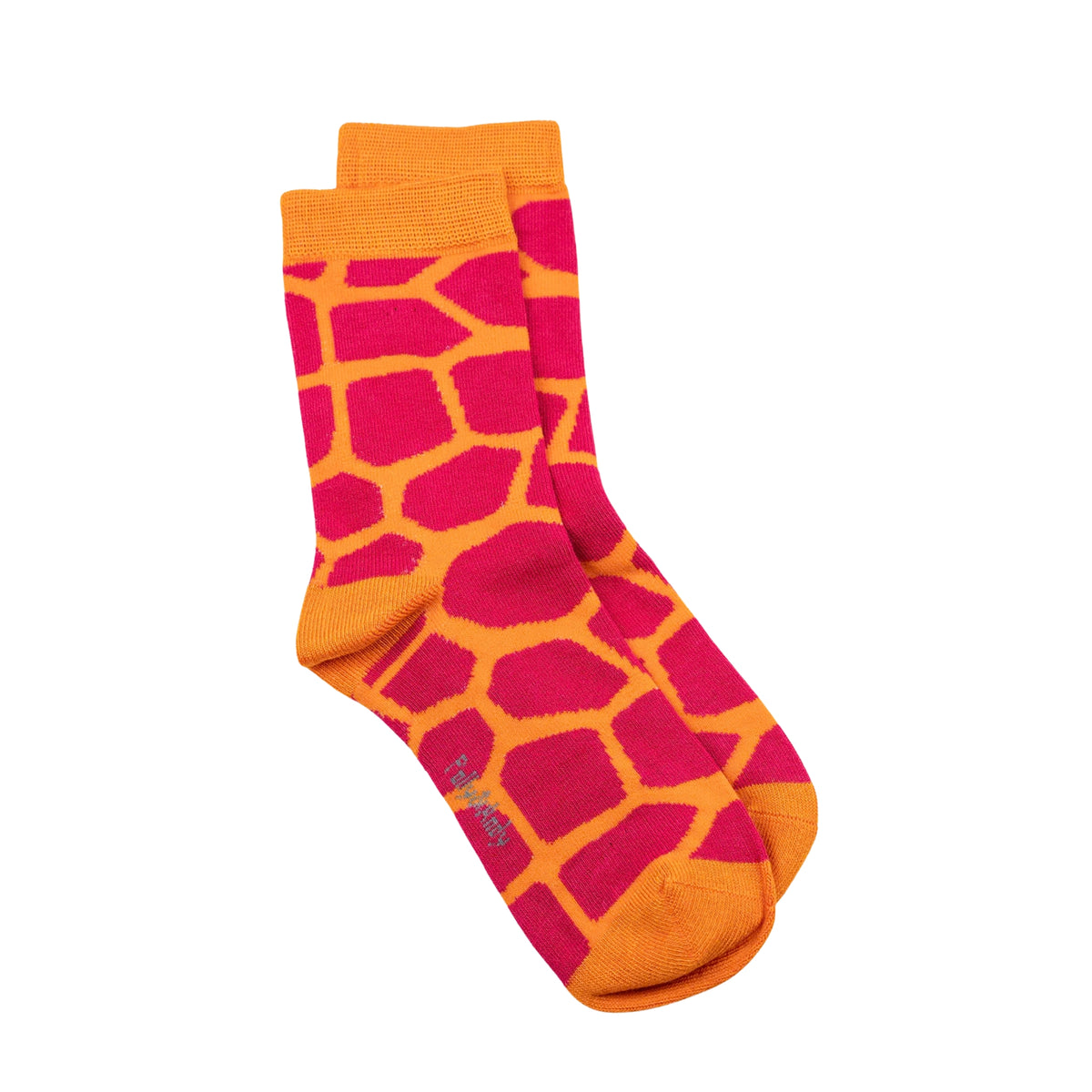 A pair of crew bamboo seamless socks featuring a giraffe-inspired pattern with bright orange and red sections, shown against a plain white background.